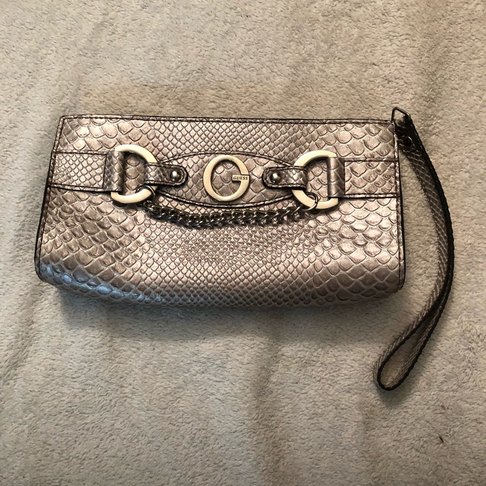 Guess small silver clutch/wristlet